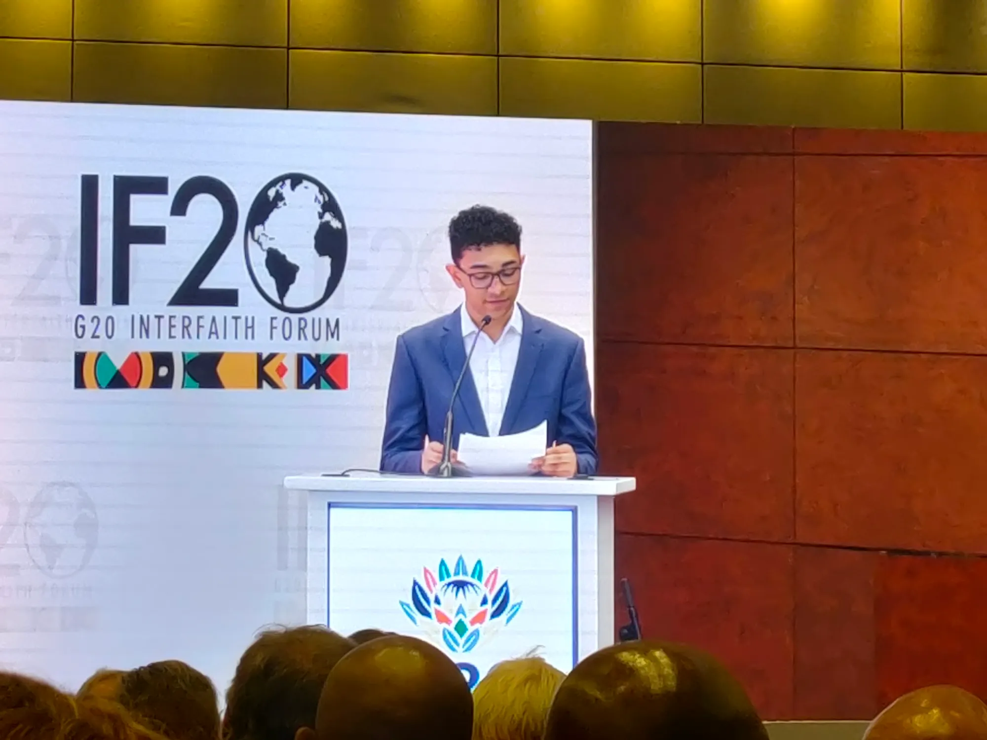 Michael-Daniel Bam Giving a G20 Interfaith Forum Highlight